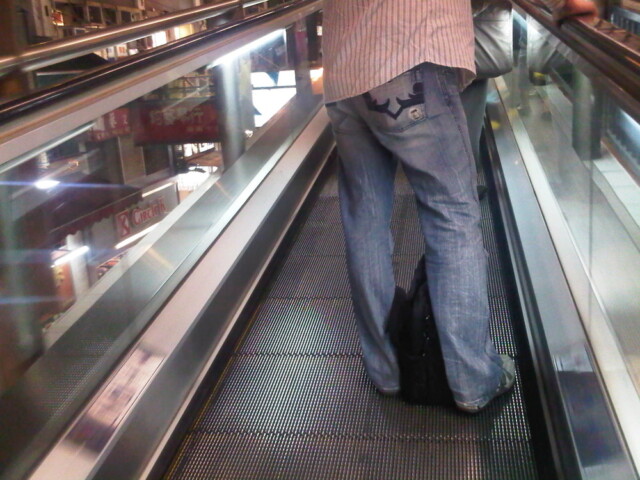 Riding the outdoor escalator through the Mid-Levels looking for food