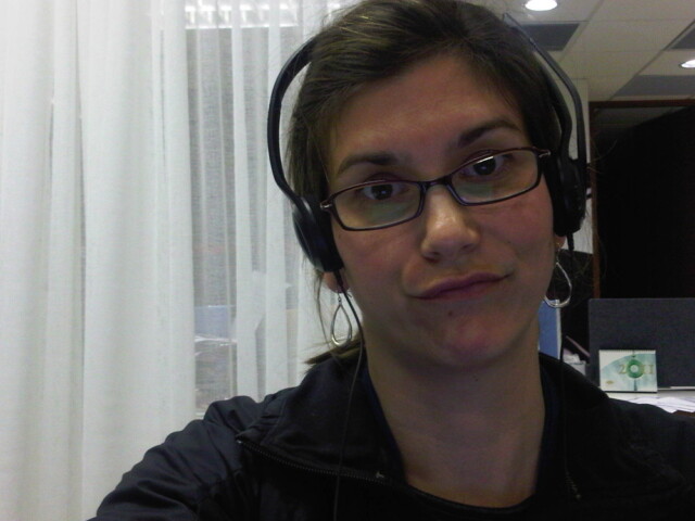 Dorky face with dorky work headphones