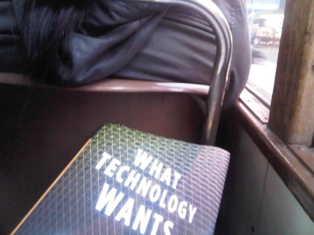 Reading my book on the tram