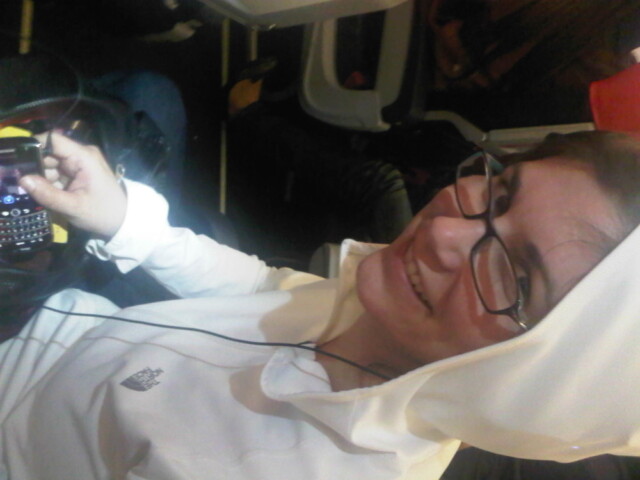 Mid flight back from Penang to HK watching Airplane on Ty’s phone with his headphones