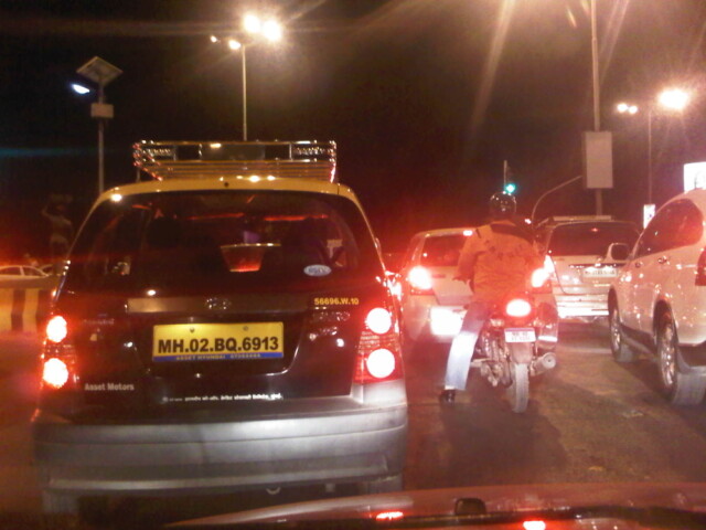 In traffic next to the Arabian Sea in Mumbai