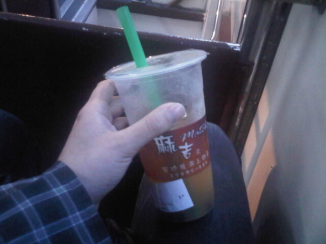 Mango green tea with pearl for the tram home