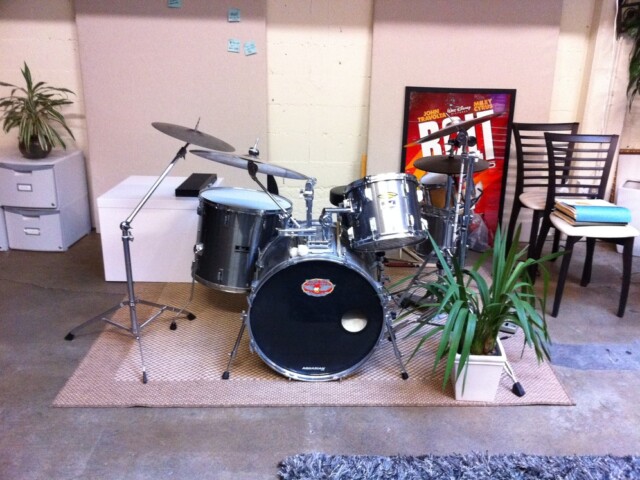 Drum set at the office that might make Kik jealous