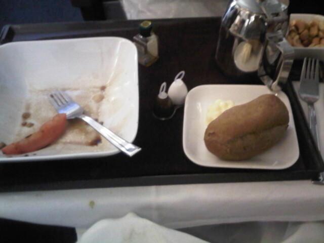 Remnants of an in flight meal en route from detroit to tokyo