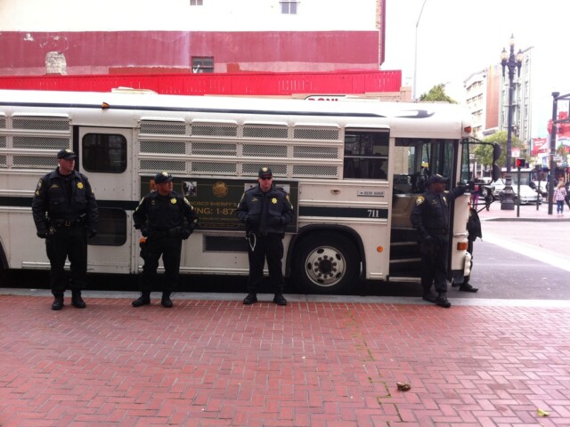 Nearby I saw 100 police with batons. Getting ready for a BART protest. This must be the arrest-mobile