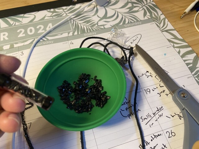 Refilling one of Dante’s broken necklaces